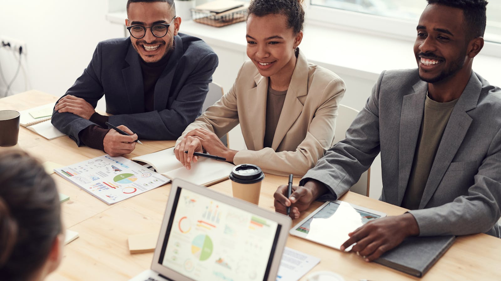Entrepreneur reviewing a business plan while preparing to secure funding for a new business.