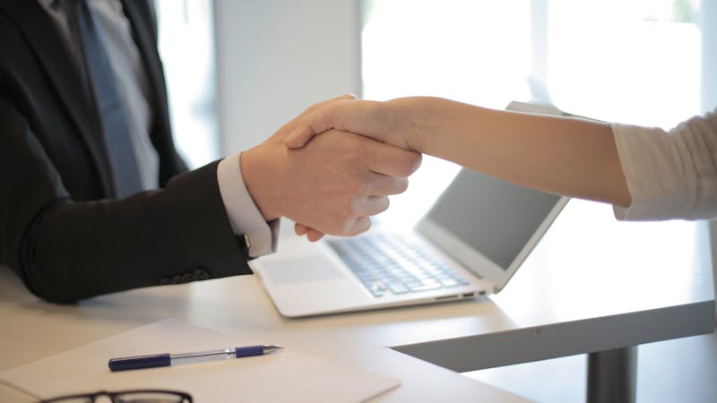 Business owners reviewing subordinated lending and second-position financing options.